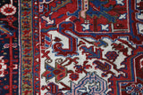 Antique Persian area rug in a living room setting, pile rug, vintage rug, portland, rug shop, bright colors, wild shaman, soft rug, bold color, Portland, Oregon, rug store, rug shop, local shop, antique rug, Persian rug, handmade rug, wool rug, distressed rug