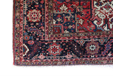 Antique Persian area rug in a living room setting, pile rug, vintage rug, portland, rug shop, bright colors, wild shaman, soft rug, bold color, Portland, Oregon, rug store, rug shop, local shop, antique rug, Persian rug, handmade rug, wool rug, distressed rug