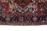 Antique Persian area rug in a living room setting, pile rug, vintage rug, portland, rug shop, bright colors, wild shaman, soft rug, bold color, Portland, Oregon, rug store, rug shop, local shop, antique rug, Persian rug, handmade rug, wool rug, distressed rug