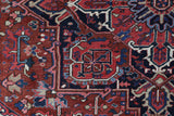 Antique Persian area rug in a living room setting, pile rug, vintage rug, portland, rug shop, bright colors, wild shaman, soft rug, bold color, Portland, Oregon, rug store, rug shop, local shop, antique rug, Persian rug, handmade rug, wool rug, distressed rug
