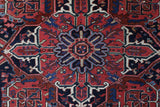 Antique Persian area rug in a living room setting, pile rug, vintage rug, portland, rug shop, bright colors, wild shaman, soft rug, bold color, Portland, Oregon, rug store, rug shop, local shop, antique rug, Persian rug, handmade rug, wool rug, distressed rug