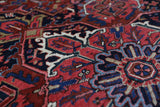 Antique Persian area rug in a living room setting, pile rug, vintage rug, portland, rug shop, bright colors, wild shaman, soft rug, bold color, Portland, Oregon, rug store, rug shop, local shop, antique rug, Persian rug, handmade rug, wool rug, distressed rug