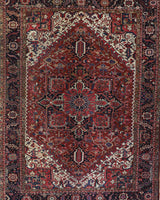 Antique Persian area rug in a living room setting, pile rug, vintage rug, portland, rug shop, bright colors, wild shaman, soft rug, bold color, Portland, Oregon, rug store, rug shop, local shop, antique rug, Persian rug, handmade rug, wool rug, distressed rug