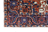 Antique Persian area rug in a living room setting, pile rug, vintage rug, portland, rug shop, bright colors, wild shaman, soft rug, bold color, Portland, Oregon, rug store, rug shop, local shop, antique rug, Persian rug, handmade rug, wool rug, distressed rug