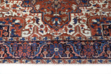Antique Persian area rug in a living room setting, pile rug, vintage rug, portland, rug shop, bright colors, wild shaman, soft rug, bold color, Portland, Oregon, rug store, rug shop, local shop, antique rug, Persian rug, handmade rug, wool rug, distressed rug