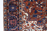 Antique Persian area rug in a living room setting, pile rug, vintage rug, portland, rug shop, bright colors, wild shaman, soft rug, bold color, Portland, Oregon, rug store, rug shop, local shop, antique rug, Persian rug, handmade rug, wool rug, distressed rug