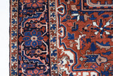 Antique Persian area rug in a living room setting, pile rug, vintage rug, portland, rug shop, bright colors, wild shaman, soft rug, bold color, Portland, Oregon, rug store, rug shop, local shop, antique rug, Persian rug, handmade rug, wool rug, distressed rug