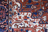 Antique Persian area rug in a living room setting, pile rug, vintage rug, portland, rug shop, bright colors, wild shaman, soft rug, bold color, Portland, Oregon, rug store, rug shop, local shop, antique rug, Persian rug, handmade rug, wool rug, distressed rug