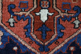 Antique Persian area rug in a living room setting, pile rug, vintage rug, portland, rug shop, bright colors, wild shaman, soft rug, bold color, Portland, Oregon, rug store, rug shop, local shop, antique rug, Persian rug, handmade rug, wool rug, distressed rug