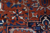 Antique Persian area rug in a living room setting, pile rug, vintage rug, portland, rug shop, bright colors, wild shaman, soft rug, bold color, Portland, Oregon, rug store, rug shop, local shop, antique rug, Persian rug, handmade rug, wool rug, distressed rug