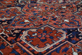 Antique Persian area rug in a living room setting, pile rug, vintage rug, portland, rug shop, bright colors, wild shaman, soft rug, bold color, Portland, Oregon, rug store, rug shop, local shop, antique rug, Persian rug, handmade rug, wool rug, distressed rug