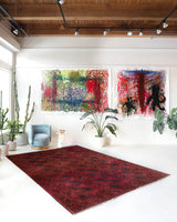 Antique Turkmen rug in a living room setting, pile rug, Turkish rug, vintage rug, portland, rug shop, bright colors, wild shaman, soft rug, bold color, Portland, Oregon, rug store, rug shop, local shop, antique rug