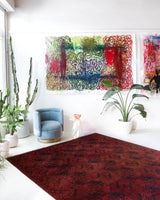 Antique Turkmen rug in a living room setting, pile rug, Turkish rug, vintage rug, portland, rug shop, bright colors, wild shaman, soft rug, bold color, Portland, Oregon, rug store, rug shop, local shop, antique rug