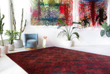 Antique Turkmen rug in a living room setting, pile rug, Turkish rug, vintage rug, portland, rug shop, bright colors, wild shaman, soft rug, bold color, Portland, Oregon, rug store, rug shop, local shop, antique rug