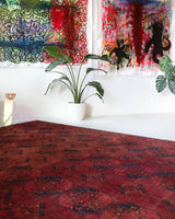 Antique Turkmen rug in a living room setting, pile rug, Turkish rug, vintage rug, portland, rug shop, bright colors, wild shaman, soft rug, bold color, Portland, Oregon, rug store, rug shop, local shop, antique rug