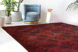 Antique Turkmen rug in a living room setting, pile rug, Turkish rug, vintage rug, portland, rug shop, bright colors, wild shaman, soft rug, bold color, Portland, Oregon, rug store, rug shop, local shop, antique rug