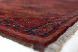 Antique Turkmen rug in a living room setting, pile rug, Turkish rug, vintage rug, portland, rug shop, bright colors, wild shaman, soft rug, bold color, Portland, Oregon, rug store, rug shop, local shop, antique rug