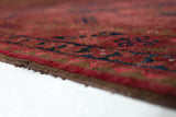 Antique Turkmen rug in a living room setting, pile rug, Turkish rug, vintage rug, portland, rug shop, bright colors, wild shaman, soft rug, bold color, Portland, Oregon, rug store, rug shop, local shop, antique rug
