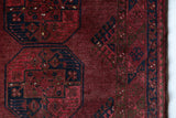 Antique Turkmen rug in a living room setting, pile rug, Turkish rug, vintage rug, portland, rug shop, bright colors, wild shaman, soft rug, bold color, Portland, Oregon, rug store, rug shop, local shop, antique rug
