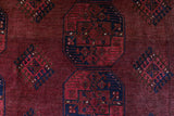 Antique Turkmen rug in a living room setting, pile rug, Turkish rug, vintage rug, portland, rug shop, bright colors, wild shaman, soft rug, bold color, Portland, Oregon, rug store, rug shop, local shop, antique rug