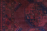 Antique Turkmen rug in a living room setting, pile rug, Turkish rug, vintage rug, portland, rug shop, bright colors, wild shaman, soft rug, bold color, Portland, Oregon, rug store, rug shop, local shop, antique rug
