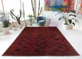 Antique Turkmen rug in a living room setting, pile rug, Turkish rug, vintage rug, portland, rug shop, bright colors, wild shaman, soft rug, bold color, Portland, Oregon, rug store, rug shop, local shop, antique rug