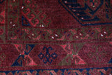 Antique Turkmen rug in a living room setting, pile rug, Turkish rug, vintage rug, portland, rug shop, bright colors, wild shaman, soft rug, bold color, Portland, Oregon, rug store, rug shop, local shop, antique rug