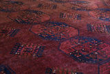 Antique Turkmen rug in a living room setting, pile rug, Turkish rug, vintage rug, portland, rug shop, bright colors, wild shaman, soft rug, bold color, Portland, Oregon, rug store, rug shop, local shop, antique rug