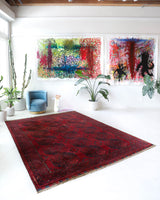 Antique Turkmen rug in a living room setting, pile rug, Turkish rug, vintage rug, portland, rug shop, bright colors, wild shaman, soft rug, bold color, Portland, Oregon, rug store, rug shop, local shop, antique rug