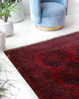 Antique Turkmen rug in a living room setting, pile rug, Turkish rug, vintage rug, portland, rug shop, bright colors, wild shaman, soft rug, bold color, Portland, Oregon, rug store, rug shop, local shop, antique rug