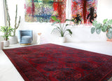 Antique Turkmen rug in a living room setting, pile rug, Turkish rug, vintage rug, portland, rug shop, bright colors, wild shaman, soft rug, bold color, Portland, Oregon, rug store, rug shop, local shop, antique rug