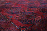 Antique Turkmen rug in a living room setting, pile rug, Turkish rug, vintage rug, portland, rug shop, bright colors, wild shaman, soft rug, bold color, Portland, Oregon, rug store, rug shop, local shop, antique rug