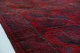 Antique Turkmen rug in a living room setting, pile rug, Turkish rug, vintage rug, portland, rug shop, bright colors, wild shaman, soft rug, bold color, Portland, Oregon, rug store, rug shop, local shop, antique rug