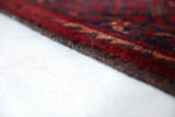 Antique Turkmen rug in a living room setting, pile rug, Turkish rug, vintage rug, portland, rug shop, bright colors, wild shaman, soft rug, bold color, Portland, Oregon, rug store, rug shop, local shop, antique rug