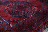 Antique Turkmen rug in a living room setting, pile rug, Turkish rug, vintage rug, portland, rug shop, bright colors, wild shaman, soft rug, bold color, Portland, Oregon, rug store, rug shop, local shop, antique rug