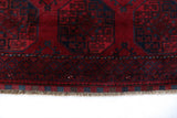 Antique Turkmen rug in a living room setting, pile rug, Turkish rug, vintage rug, portland, rug shop, bright colors, wild shaman, soft rug, bold color, Portland, Oregon, rug store, rug shop, local shop, antique rug