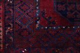 Antique Turkmen rug in a living room setting, pile rug, Turkish rug, vintage rug, portland, rug shop, bright colors, wild shaman, soft rug, bold color, Portland, Oregon, rug store, rug shop, local shop, antique rug