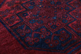 Antique Turkmen rug in a living room setting, pile rug, Turkish rug, vintage rug, portland, rug shop, bright colors, wild shaman, soft rug, bold color, Portland, Oregon, rug store, rug shop, local shop, antique rug