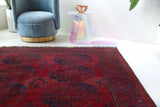 Antique Turkmen rug in a living room setting, pile rug, Turkish rug, vintage rug, portland, rug shop, bright colors, wild shaman, soft rug, bold color, Portland, Oregon, rug store, rug shop, local shop, antique rug