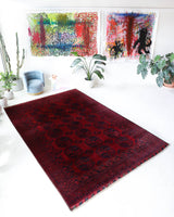 Antique Turkmen rug in a living room setting, pile rug, Turkish rug, vintage rug, portland, rug shop, bright colors, wild shaman, soft rug, bold color, Portland, Oregon, rug store, rug shop, local shop, antique rug