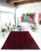 Antique Turkmen rug in a living room setting, pile rug, Turkish rug, vintage rug, portland, rug shop, bright colors, wild shaman, soft rug, bold color, Portland, Oregon, rug store, rug shop, local shop, antique rug