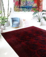 Antique Turkmen rug in a living room setting, pile rug, Turkish rug, vintage rug, portland, rug shop, bright colors, wild shaman, soft rug, bold color, Portland, Oregon, rug store, rug shop, local shop, antique rug