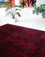 Antique Turkmen rug in a living room setting, pile rug, Turkish rug, vintage rug, portland, rug shop, bright colors, wild shaman, soft rug, bold color, Portland, Oregon, rug store, rug shop, local shop, antique rug