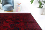 Antique Turkmen rug in a living room setting, pile rug, Turkish rug, vintage rug, portland, rug shop, bright colors, wild shaman, soft rug, bold color, Portland, Oregon, rug store, rug shop, local shop, antique rug