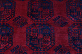 Antique Turkmen rug in a living room setting, pile rug, Turkish rug, vintage rug, portland, rug shop, bright colors, wild shaman, soft rug, bold color, Portland, Oregon, rug store, rug shop, local shop, antique rug