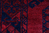 Antique Turkmen rug in a living room setting, pile rug, Turkish rug, vintage rug, portland, rug shop, bright colors, wild shaman, soft rug, bold color, Portland, Oregon, rug store, rug shop, local shop, antique rug