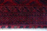 Antique Turkmen rug in a living room setting, pile rug, Turkish rug, vintage rug, portland, rug shop, bright colors, wild shaman, soft rug, bold color, Portland, Oregon, rug store, rug shop, local shop, antique rug