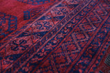 Antique Turkmen rug in a living room setting, pile rug, Turkish rug, vintage rug, portland, rug shop, bright colors, wild shaman, soft rug, bold color, Portland, Oregon, rug store, rug shop, local shop, antique rug
