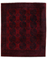 Antique Turkmen rug in a living room setting, pile rug, Turkish rug, vintage rug, portland, rug shop, bright colors, wild shaman, soft rug, bold color, Portland, Oregon, rug store, rug shop, local shop, antique rug