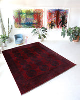Antique Turkmen rug in a living room setting, pile rug, Turkish rug, vintage rug, portland, rug shop, bright colors, wild shaman, soft rug, bold color, Portland, Oregon, rug store, rug shop, local shop, antique rug